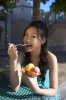 young-lady-eating-ice-cream-~-u15184965.jpg