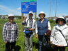 Chinese seniors in front of the NKCG signage.JPG