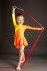 6488601-little-girl-doing-rhythmic-gymnastics-with-ribbon.jpg